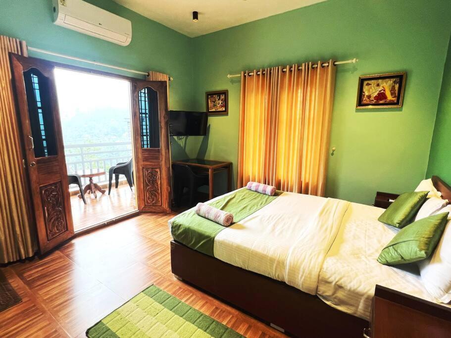 Munnar Blue Mist Bed & Breakfast Bagian luar foto